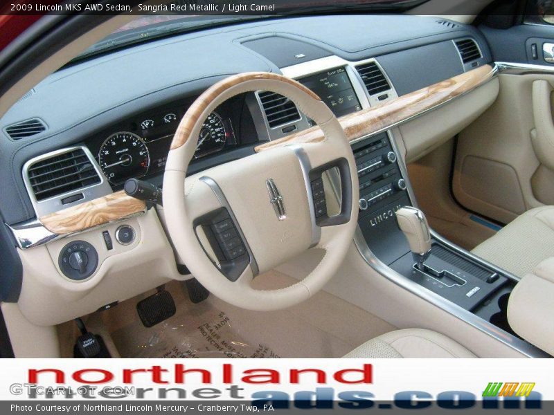 Sangria Red Metallic / Light Camel 2009 Lincoln MKS AWD Sedan