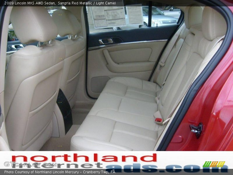 Sangria Red Metallic / Light Camel 2009 Lincoln MKS AWD Sedan