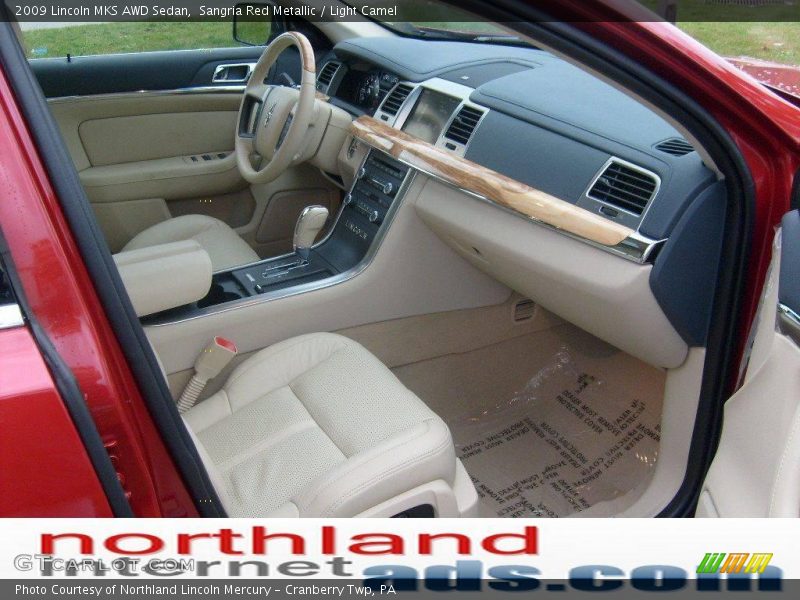 Sangria Red Metallic / Light Camel 2009 Lincoln MKS AWD Sedan