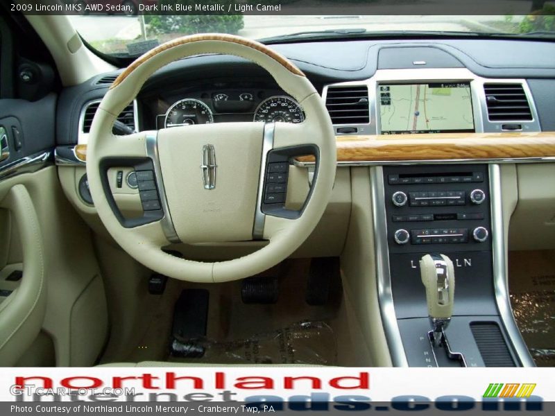 Dark Ink Blue Metallic / Light Camel 2009 Lincoln MKS AWD Sedan
