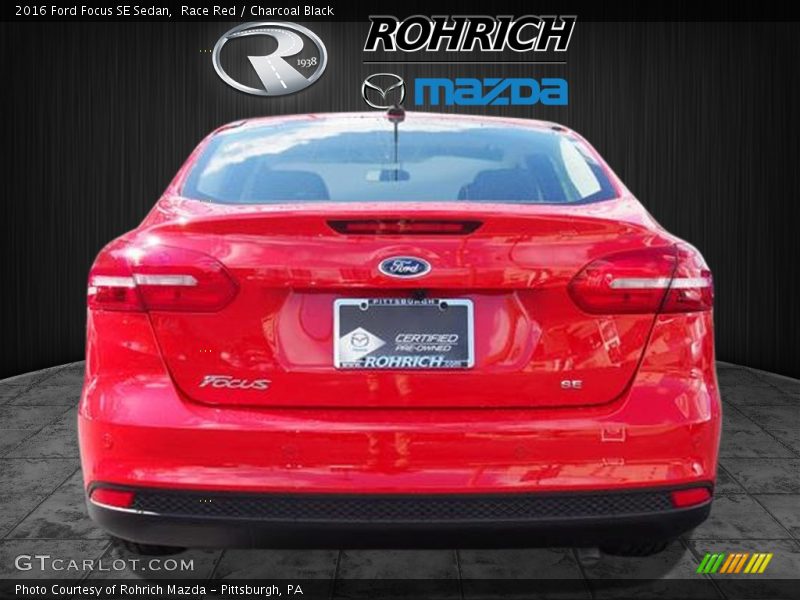 Race Red / Charcoal Black 2016 Ford Focus SE Sedan