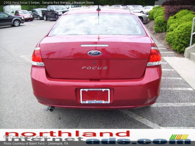 Sangria Red Metallic / Medium Stone 2009 Ford Focus S Sedan