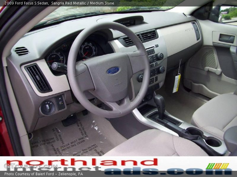 Sangria Red Metallic / Medium Stone 2009 Ford Focus S Sedan