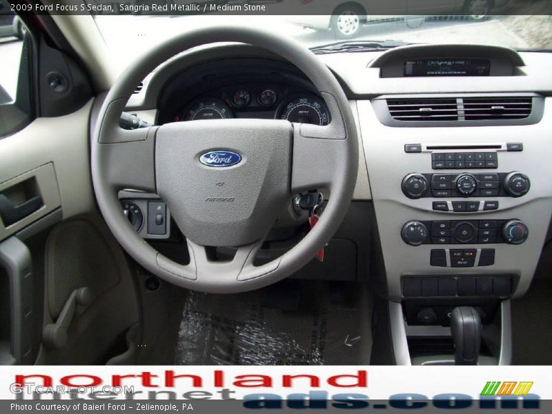 Sangria Red Metallic / Medium Stone 2009 Ford Focus S Sedan