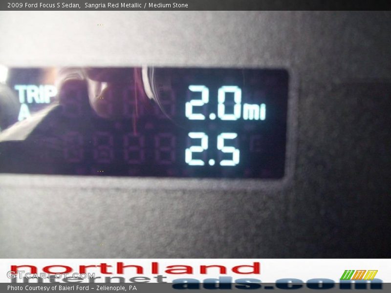 Sangria Red Metallic / Medium Stone 2009 Ford Focus S Sedan