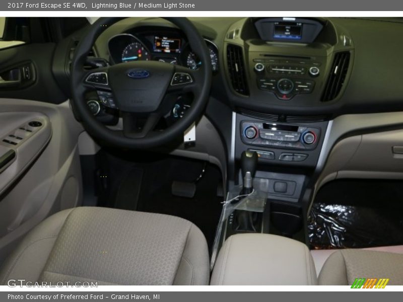 Lightning Blue / Medium Light Stone 2017 Ford Escape SE 4WD