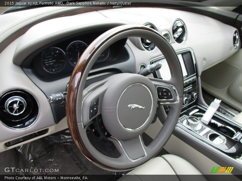 Dark Sapphire Metallic / Ivory/Oyster 2015 Jaguar XJ XJL Portfolio AWD