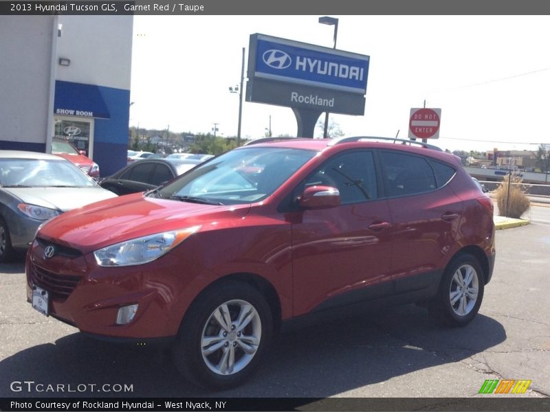 Garnet Red / Taupe 2013 Hyundai Tucson GLS