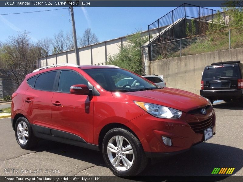 Garnet Red / Taupe 2013 Hyundai Tucson GLS