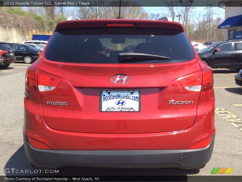 Garnet Red / Taupe 2013 Hyundai Tucson GLS