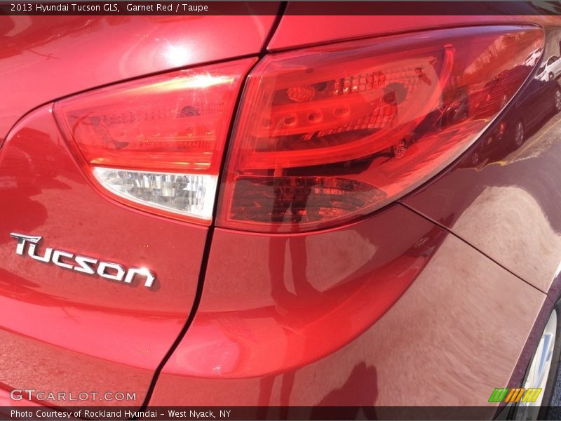 Garnet Red / Taupe 2013 Hyundai Tucson GLS