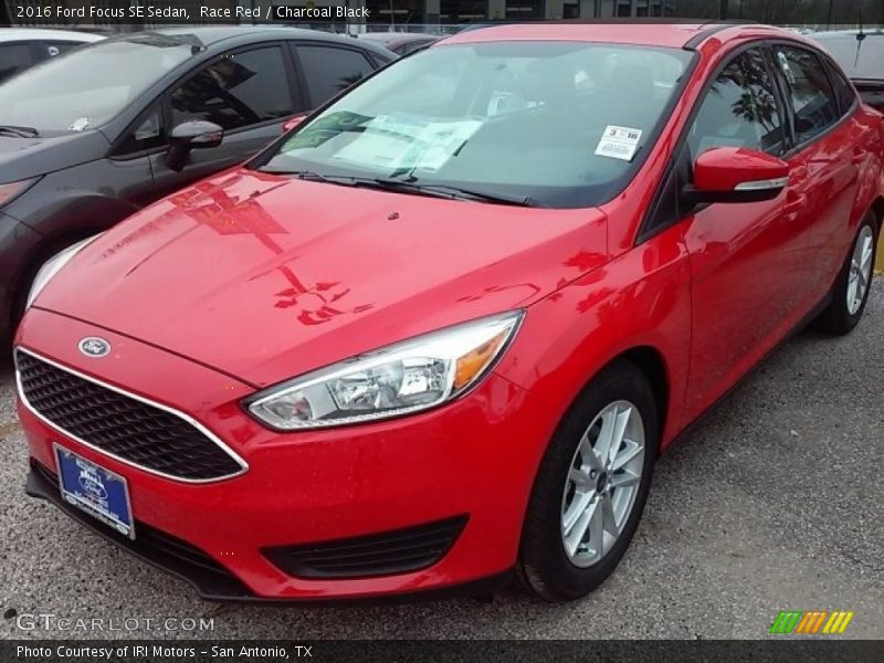 Race Red / Charcoal Black 2016 Ford Focus SE Sedan