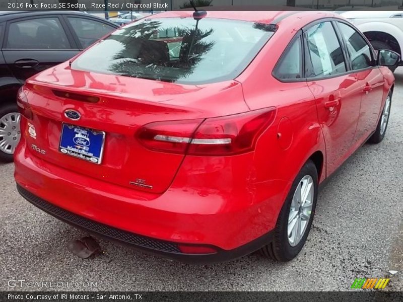 Race Red / Charcoal Black 2016 Ford Focus SE Sedan
