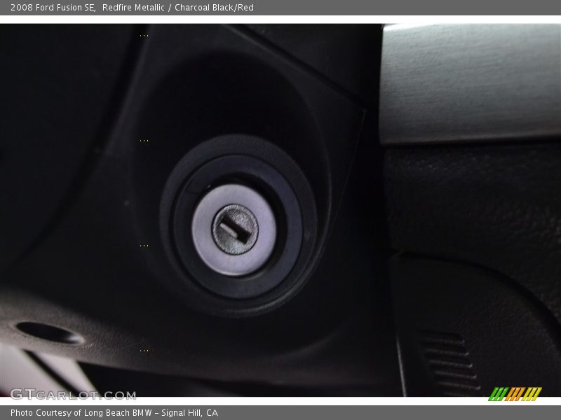 Redfire Metallic / Charcoal Black/Red 2008 Ford Fusion SE