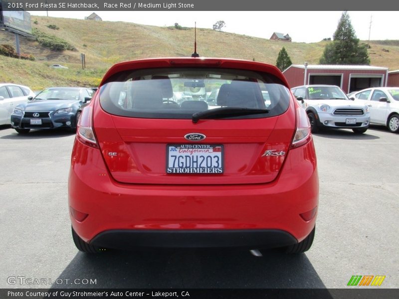Race Red / Medium Light Stone 2015 Ford Fiesta SE Hatchback