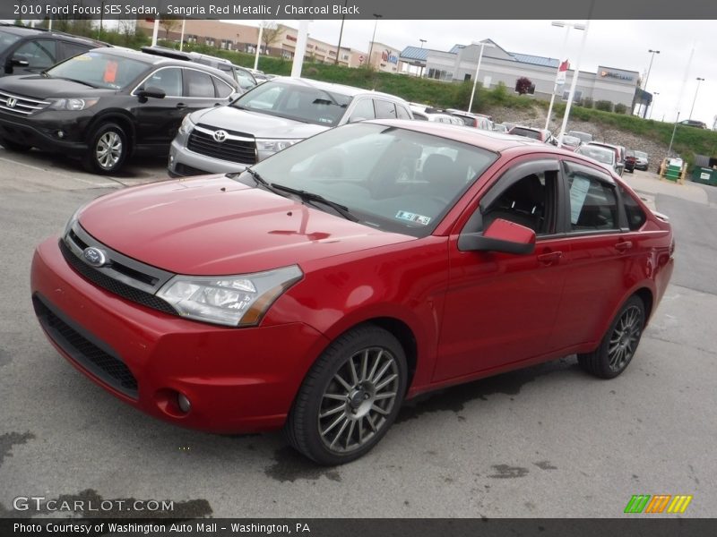 Sangria Red Metallic / Charcoal Black 2010 Ford Focus SES Sedan