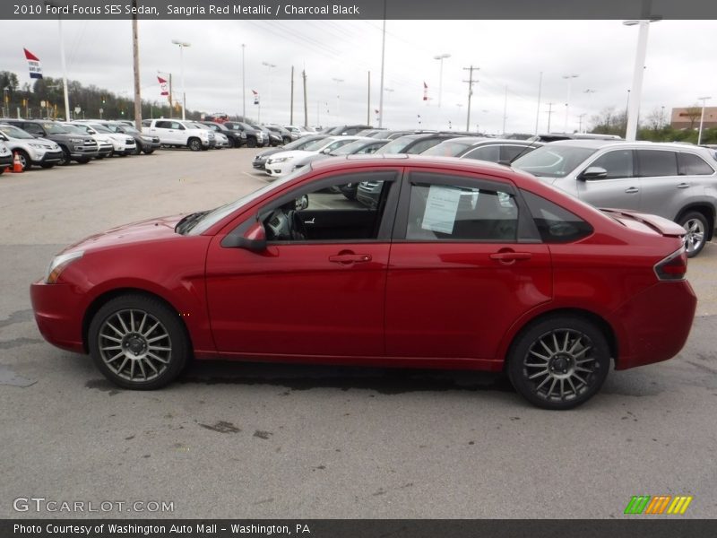 Sangria Red Metallic / Charcoal Black 2010 Ford Focus SES Sedan