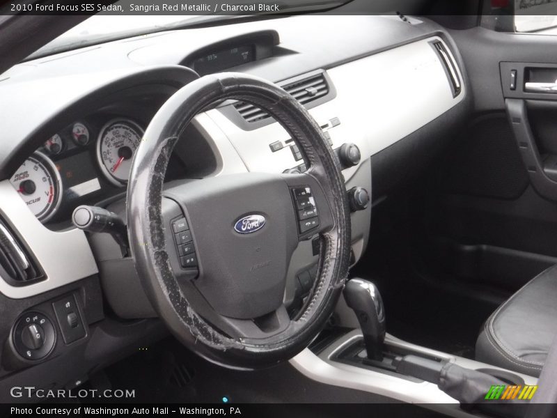 Sangria Red Metallic / Charcoal Black 2010 Ford Focus SES Sedan