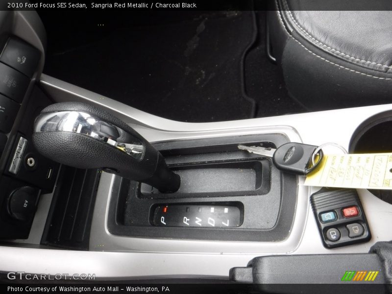 Sangria Red Metallic / Charcoal Black 2010 Ford Focus SES Sedan