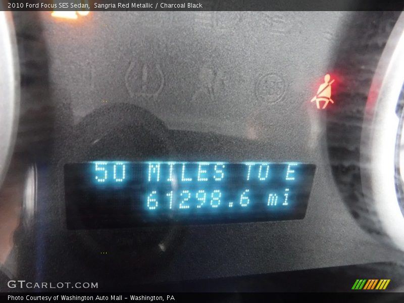 Sangria Red Metallic / Charcoal Black 2010 Ford Focus SES Sedan
