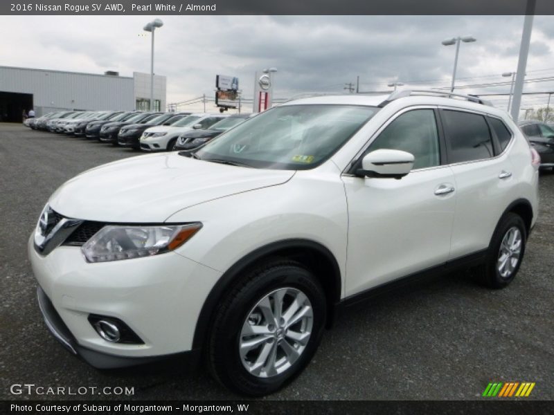 Pearl White / Almond 2016 Nissan Rogue SV AWD