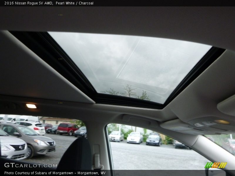 Pearl White / Charcoal 2016 Nissan Rogue SV AWD
