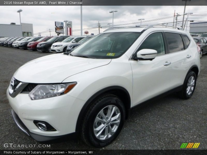 Pearl White / Charcoal 2016 Nissan Rogue SV AWD
