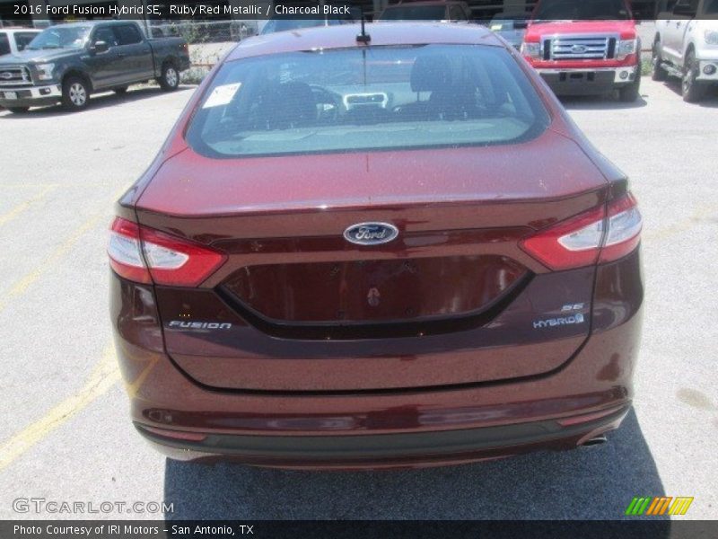 Ruby Red Metallic / Charcoal Black 2016 Ford Fusion Hybrid SE