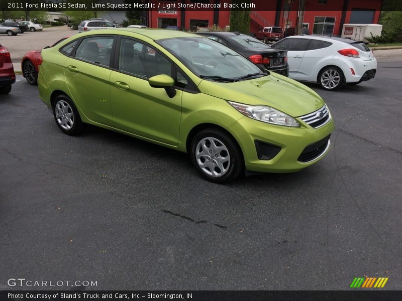 Lime Squeeze Metallic / Light Stone/Charcoal Black Cloth 2011 Ford Fiesta SE Sedan