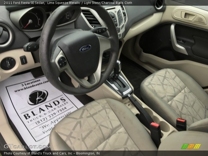 Lime Squeeze Metallic / Light Stone/Charcoal Black Cloth 2011 Ford Fiesta SE Sedan