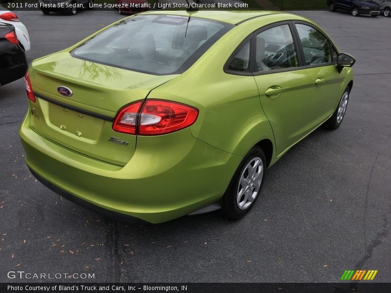 Lime Squeeze Metallic / Light Stone/Charcoal Black Cloth 2011 Ford Fiesta SE Sedan