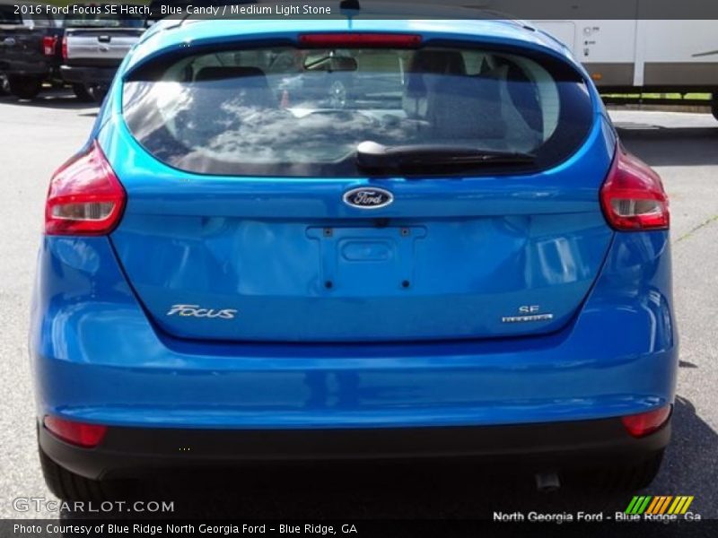 Blue Candy / Medium Light Stone 2016 Ford Focus SE Hatch