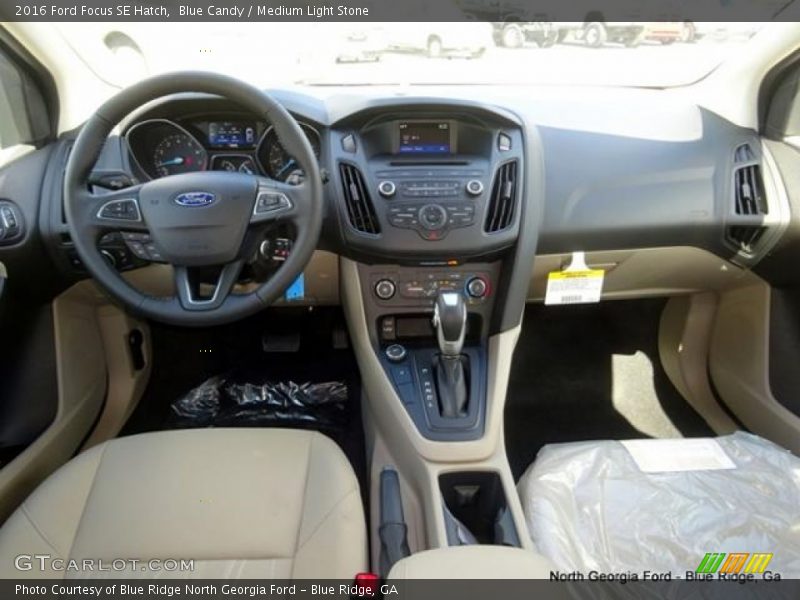 Blue Candy / Medium Light Stone 2016 Ford Focus SE Hatch