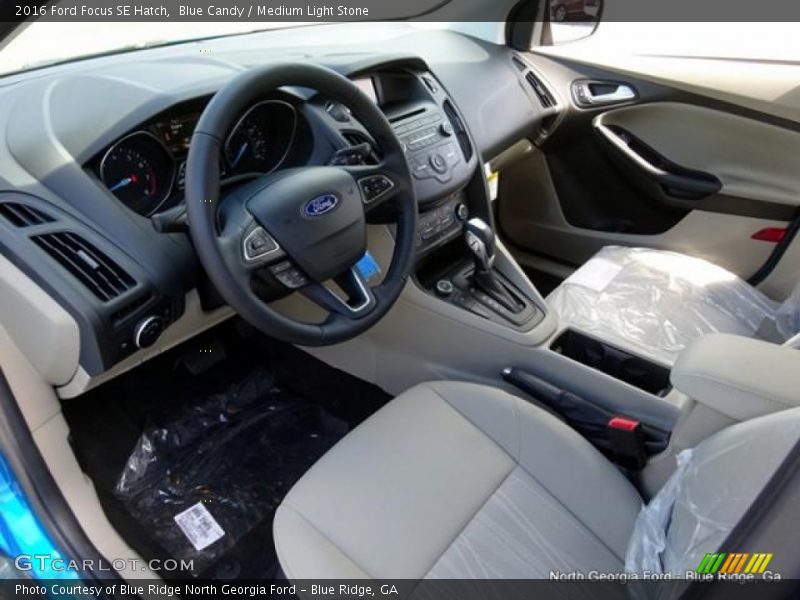 Blue Candy / Medium Light Stone 2016 Ford Focus SE Hatch