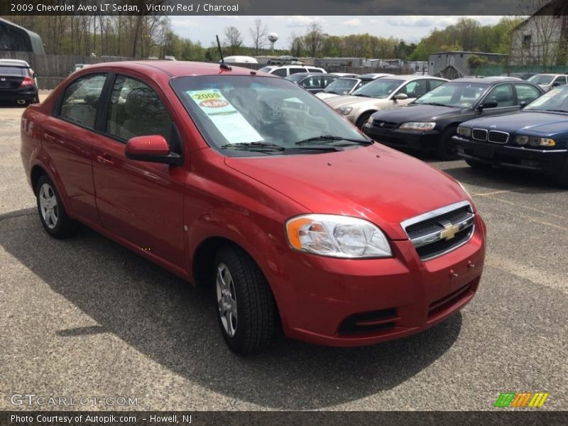 Victory Red / Charcoal 2009 Chevrolet Aveo LT Sedan