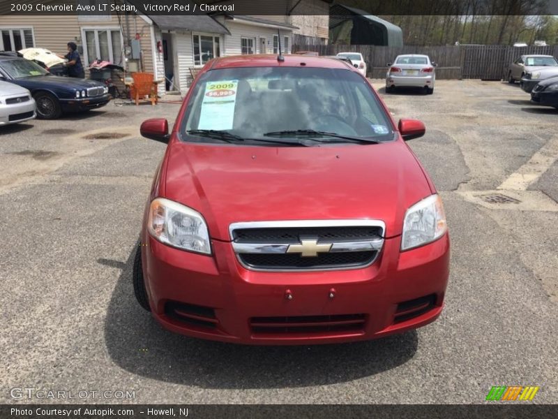 Victory Red / Charcoal 2009 Chevrolet Aveo LT Sedan