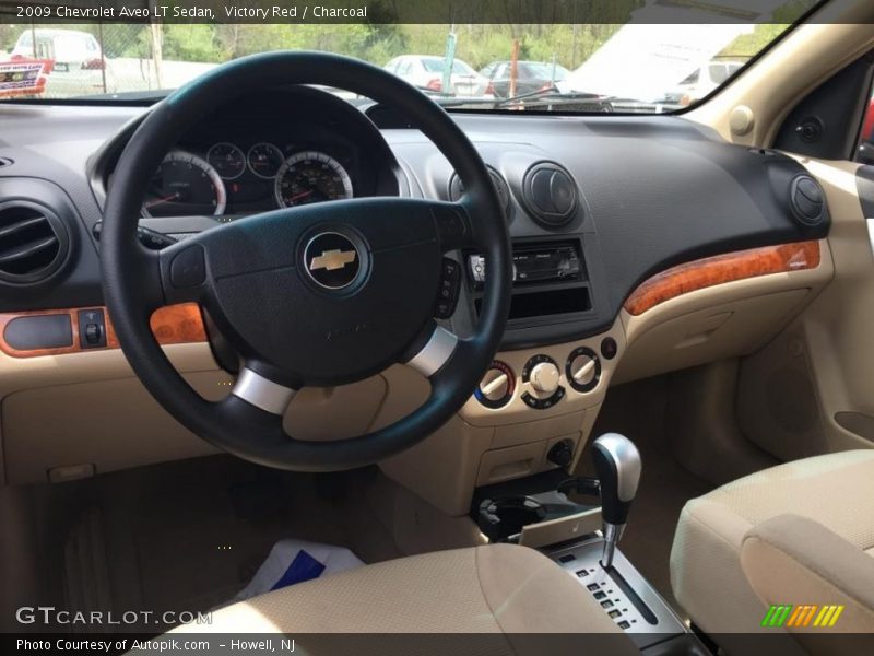 Victory Red / Charcoal 2009 Chevrolet Aveo LT Sedan
