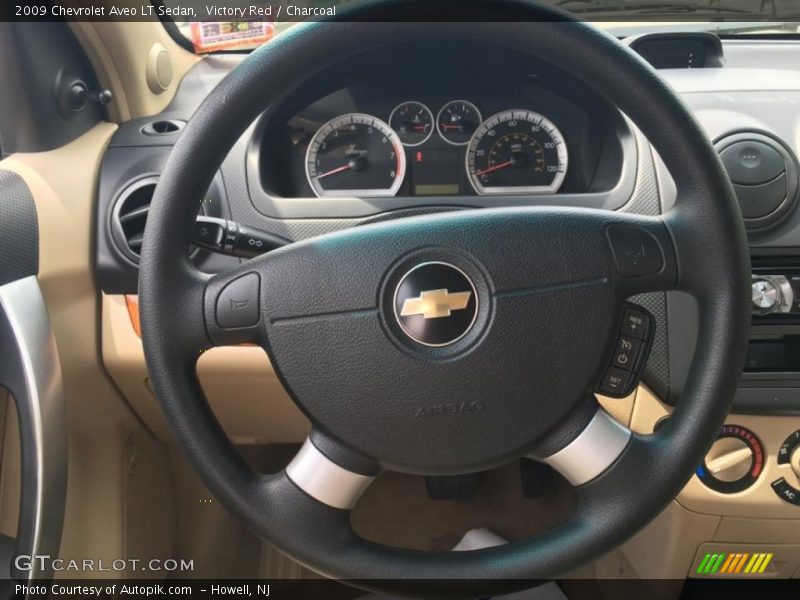 Victory Red / Charcoal 2009 Chevrolet Aveo LT Sedan