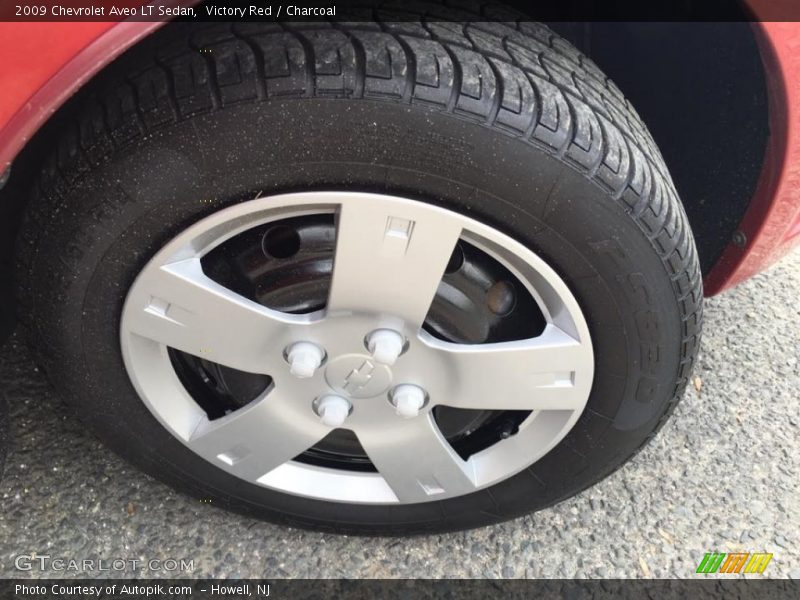 Victory Red / Charcoal 2009 Chevrolet Aveo LT Sedan
