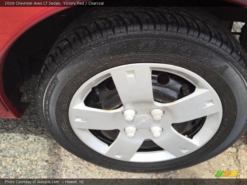 Victory Red / Charcoal 2009 Chevrolet Aveo LT Sedan