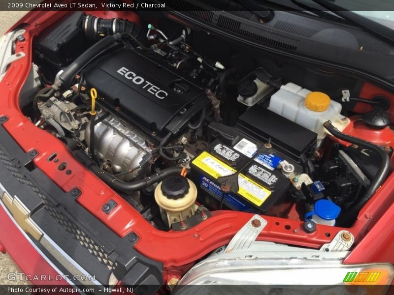 Victory Red / Charcoal 2009 Chevrolet Aveo LT Sedan