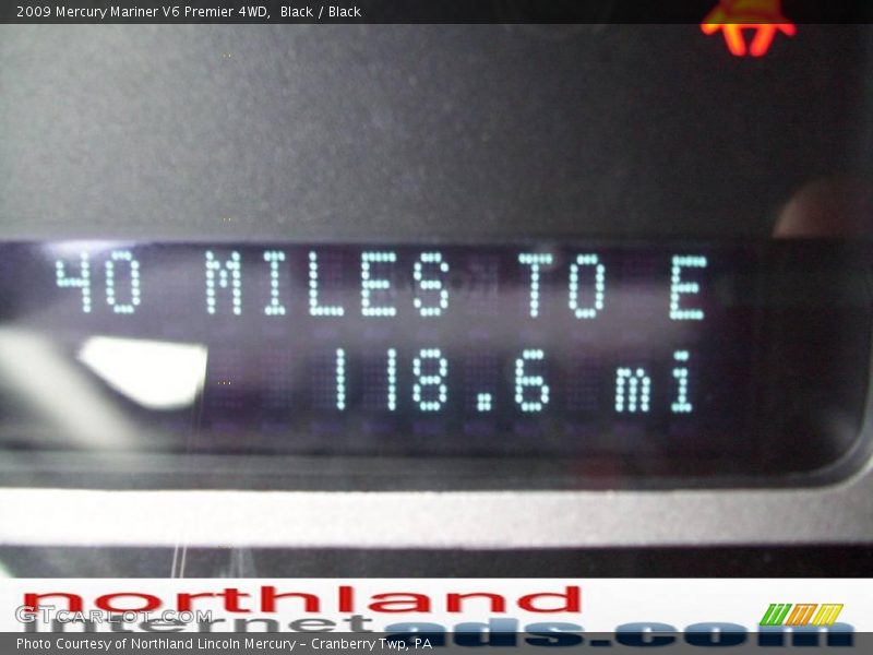 Black / Black 2009 Mercury Mariner V6 Premier 4WD