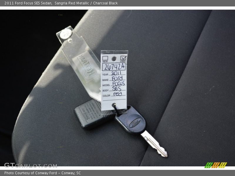 Sangria Red Metallic / Charcoal Black 2011 Ford Focus SES Sedan