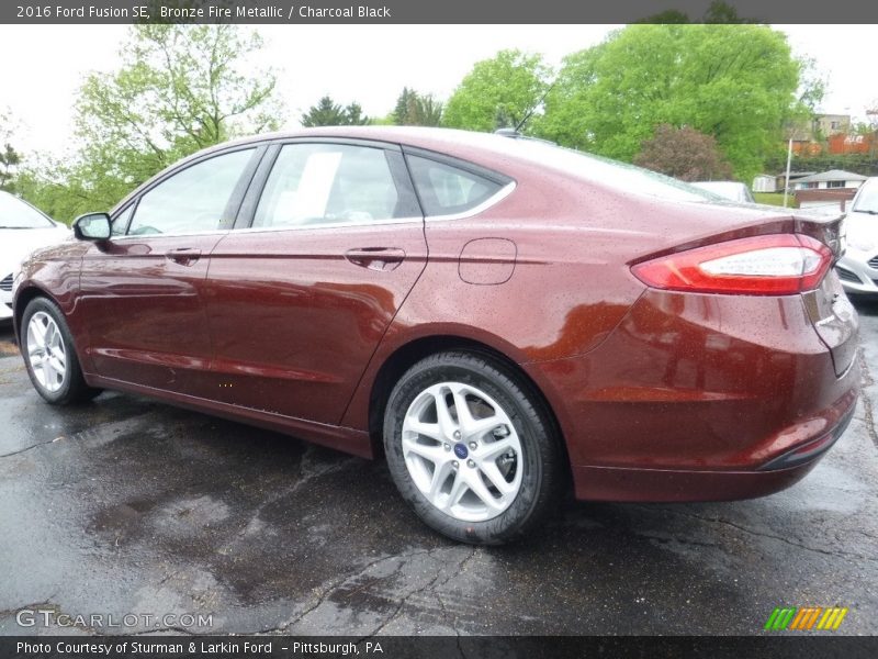 Bronze Fire Metallic / Charcoal Black 2016 Ford Fusion SE