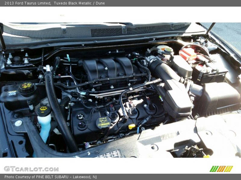 Tuxedo Black Metallic / Dune 2013 Ford Taurus Limited