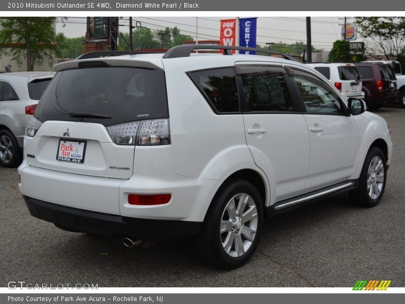 Diamond White Pearl / Black 2010 Mitsubishi Outlander SE 4WD