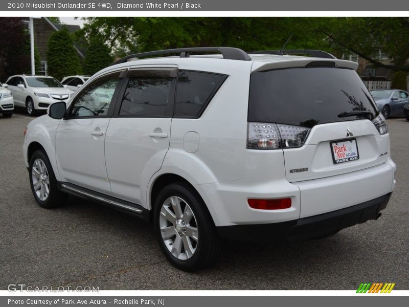 Diamond White Pearl / Black 2010 Mitsubishi Outlander SE 4WD