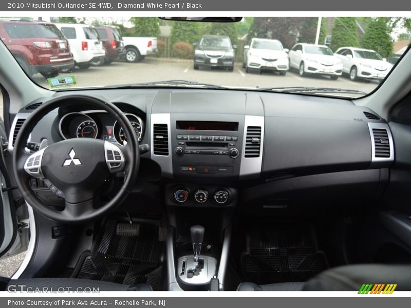 Diamond White Pearl / Black 2010 Mitsubishi Outlander SE 4WD