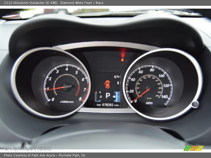 Diamond White Pearl / Black 2010 Mitsubishi Outlander SE 4WD