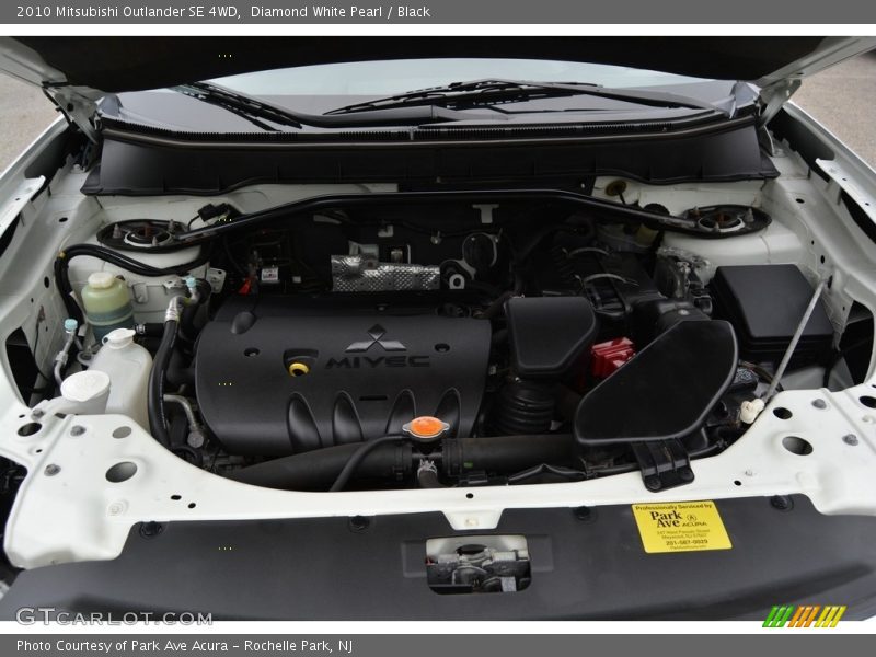 Diamond White Pearl / Black 2010 Mitsubishi Outlander SE 4WD